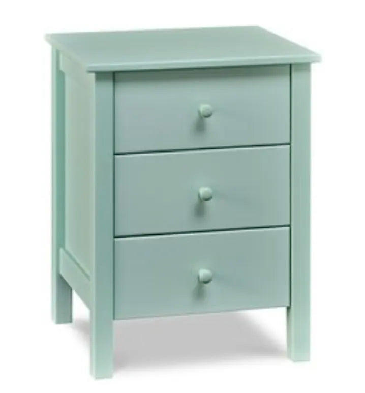 A light blue three drawer nightstand