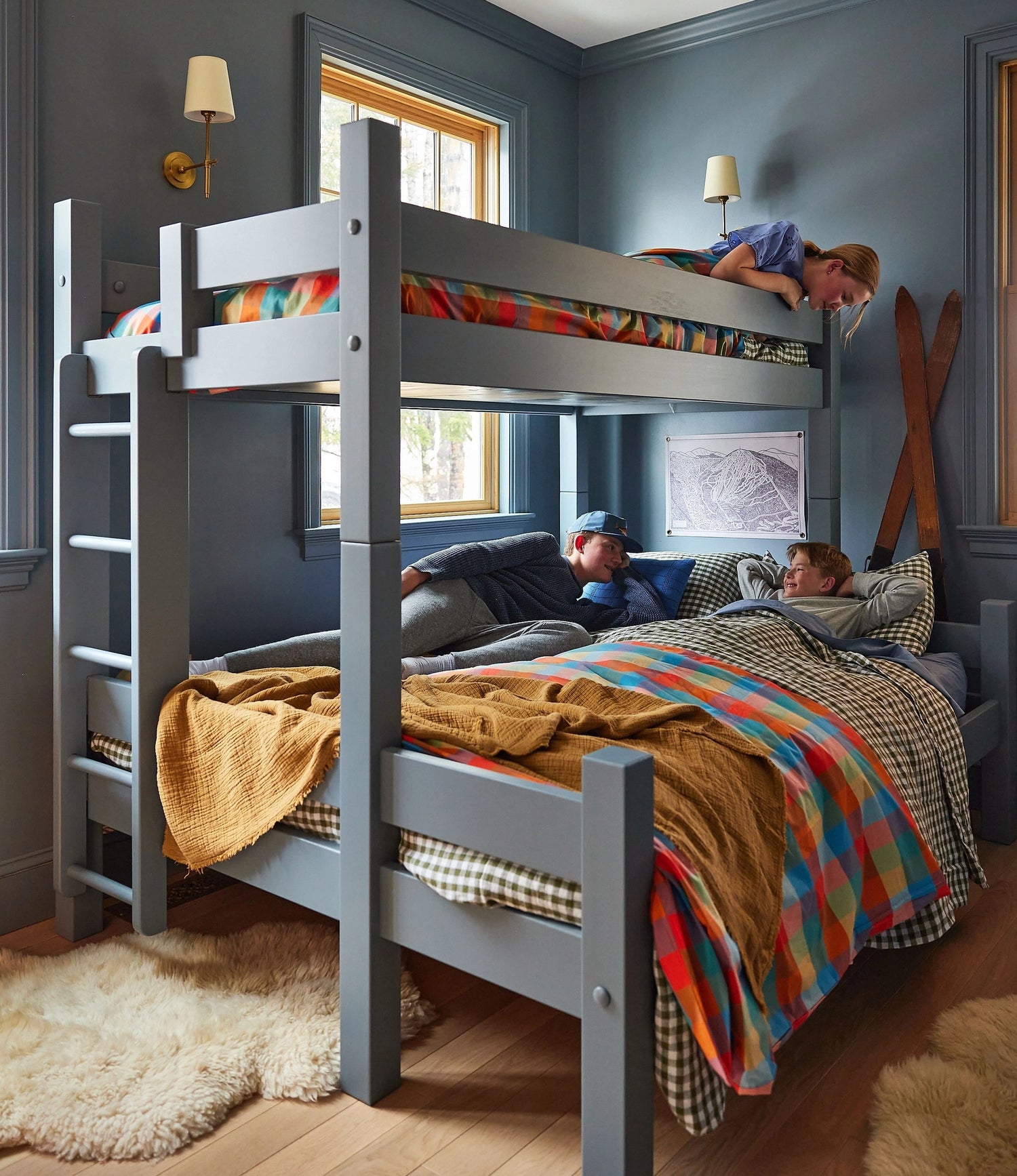 A gray twin over full bunk bed painted with Benjamin Moore paint in a bedroom with matching wall colors.